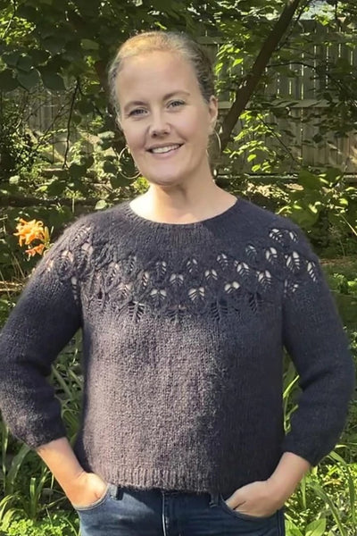 a gray pullover sweater with a lace yoke