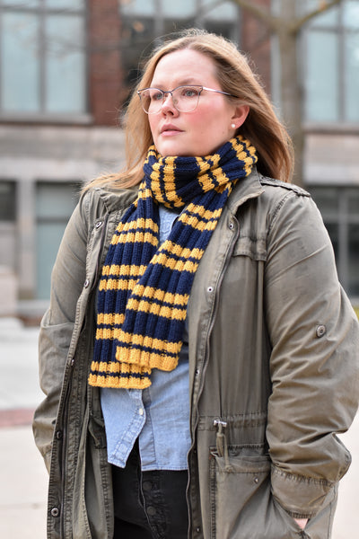 a navy and yellow rib knit scarf