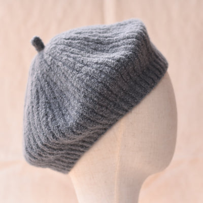 a gray ribbed beret knitted hat
